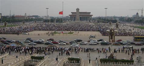 (files) in a file picture taken on june 4, 1989 chinese residents check a burning armoured personnel carrier which was set on fire during clashes near tiananmen square in beijing. Tiananmen Square, A Place of People Heroes - Travelling Moods