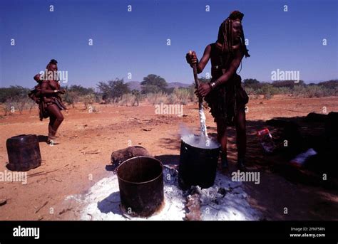 Women Of The Himba People At The Kunene The Border River To Angola