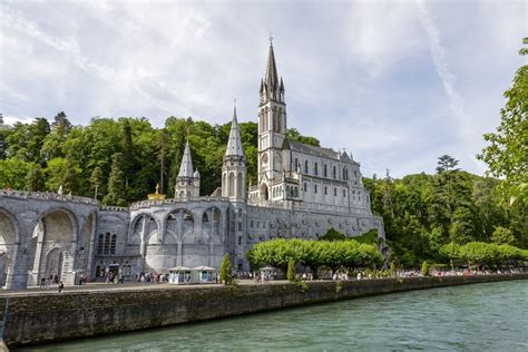 The Basilica Of Lourdes At Gave De Pau River Crossroads Initiative