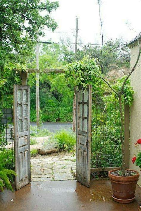 Find photos of yard door. Old doors repurposed as entrance gate to a yard. | Garden ...