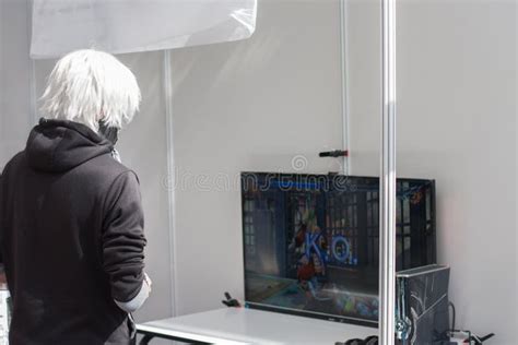 Unidentified Teenager Playing Console Games At Animefest Editorial