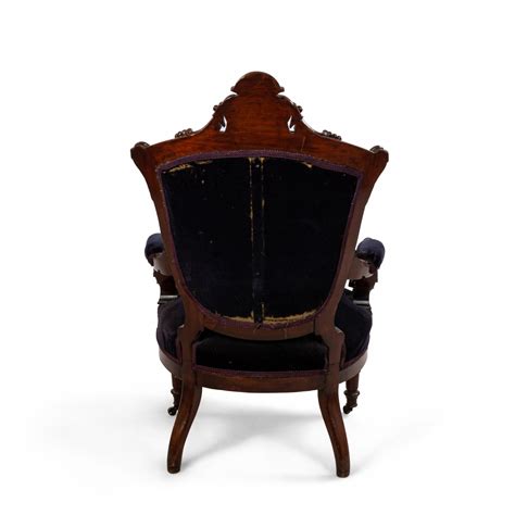 This statement chair will happily take centre stage near the fireplace in any living room or make a stylish addition to your study or library. Victorian eastlake blue velvet arm chair