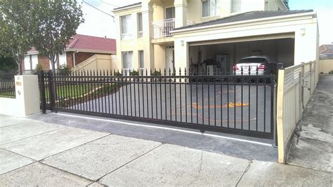 You have already installed the fence so now you are at the last part, installing the gate opener. Sliding Gates Melbourne - Electric Sliding Driveway Gate