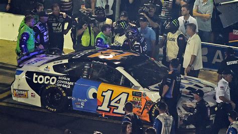 Nascar driver clint bowyer rains punches down on ryan newman after race. NASCAR All-Star Race: Clint Bowyer punches Ryan Newman on ...