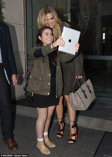 Khloe Kardashian Dons Tight Green Keyhole Dress A Year After Sister Kim
