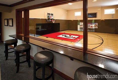With this amazing indoor basketball court, you can invite your friends over for some friendly competition, no matter what time of year it is! Taking it to the hoop: basketball room designs ...