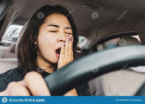 Tired Sleepy Asian Woman Yawning During Driving Car Stock Photo Image