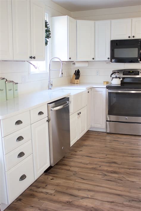 Spread the cost with up to 4 years interest free credit Kitchen Progress: Pergo Flooring Before and After - Lauren ...