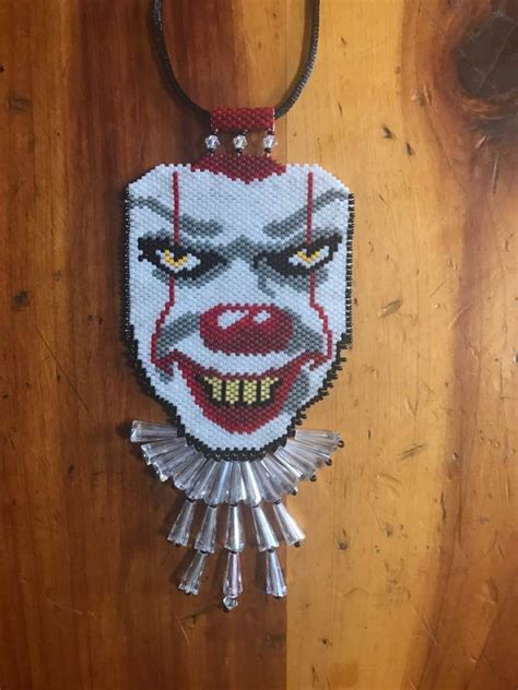 Count over on if the pattern is colored, use corresponding colored paints. Pennywise Clown peyote beaded necklace | Perler bead ...