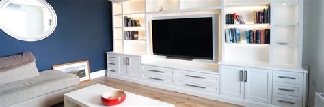 Our work has covered kitchen cabinets, shoe rack, tv cabinet, bathroom cabinet, wardrobe & many more. Built in TV unit | Built In Solutions | Built in Solutions