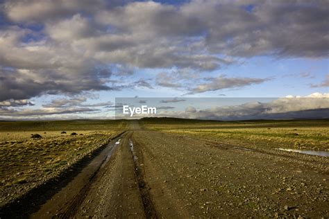 Scenic View Of Landscape Against Cloudy Sky Id 121697759