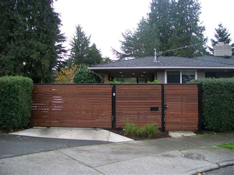 I also saw where you showed an area where another driveway could go. Wooden privacy slide gate with a matching pedestrian gate ...