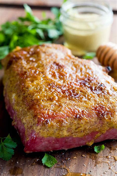 This crock pot corned beef is cooked in guinness beer, making it crispy, juicy, and simply mouthwatering. Baked Honey Mustard Corned Beef - Jessica Gavin