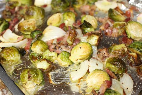 To give my oven roasted brussels sprouts a thanksgiving theme, i added a couple of strips of bacon, some toasted walnuts and topped the whole thing with dried cranberries. Oven Roasted Brussel Sprouts