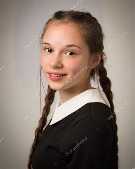 Beautiful Teenage Girl With Plaits Dressed In Black Stock Photo By