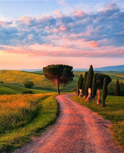 Sun Sets Over Hills In Tuscany Italy Scenery Beautiful Landscapes