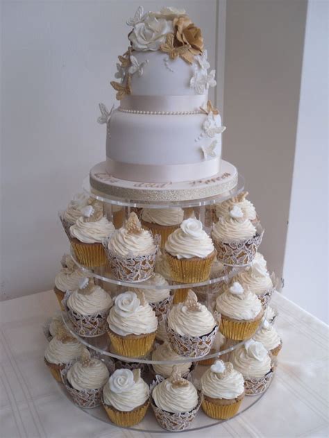 Simple And Gorgeous White And Gold Wedding Cupcake Tower With The Wedd