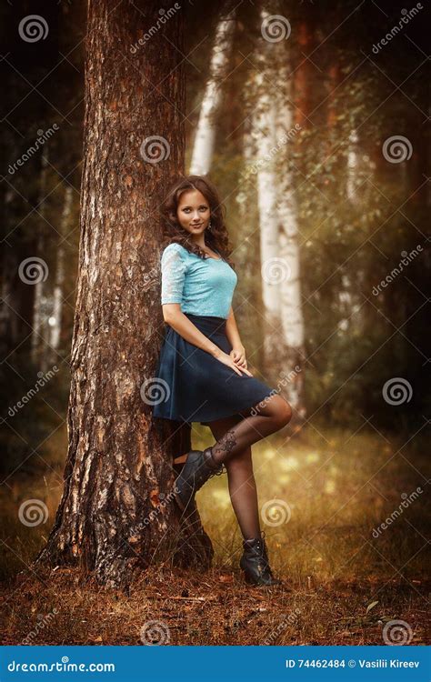 Cropped View Of Beautiful Young Woman Walking In Forest Stock Photo