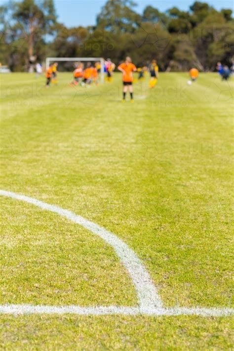 Image Of Soccer Field With Kids Playing Soccer Austockphoto