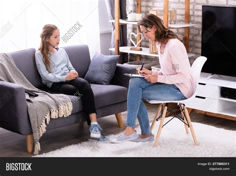 Girl Sitting On Sofa Image And Photo Free Trial Bigstock