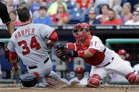 Mets minor leaguer tim tebow announces retirement from baseball. Philadelphia Phillies catcher Carlos Ruiz, right, tags out ...