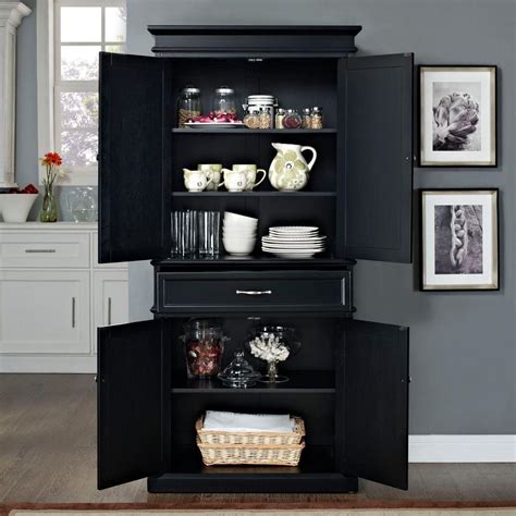 The small lower cabinet can also be used to store i need a pantry in white to coordinate with my kitchen. Crosley Parsons Black Storage Cabinet-CF3100-BK - The Home ...