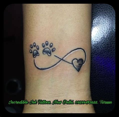 Infinity Dog Paw Print Tattoo On Wrist