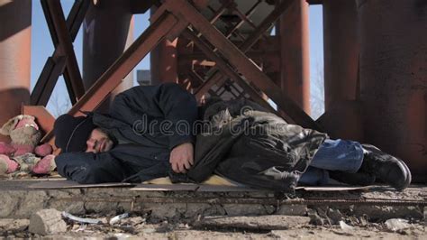 Homeless Man Sleeping Outside In Cold Weather Stock Footage Video Of
