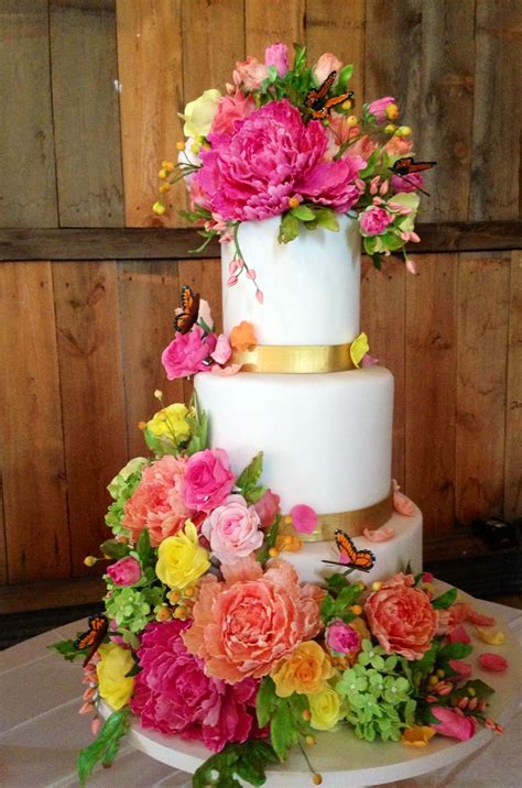 A Whimsical Sugar Flower And Sugar Butterfly Wedding Cake