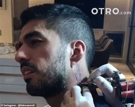 Luis suarez has got new ink, and the design has a pretty special meaning to because the new tattoo, below the left half of suarez's face, simply features two fingers and thumb. Barcelona's Luis Suarez gets new neck tattoo of his ...