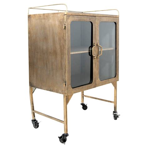 Creative Co Op Metal Cabinet With Locking Caster Wheels And Glass Doors