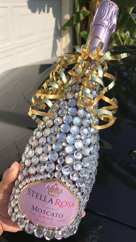 Our champagne gifts are guaranteed to be made with only the finest in the world including moet et chandon, dom perignon, and many other premium brands. Pin by Tam Flowers on crafts in 2020 | Bedazzled bottle ...