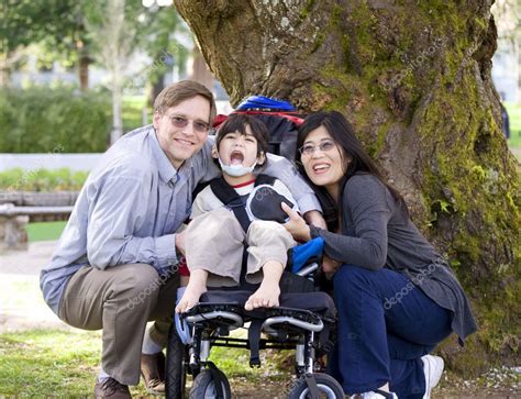 Disabled Child Surrounded By Parents — Stock Photo © Jarenwicklund