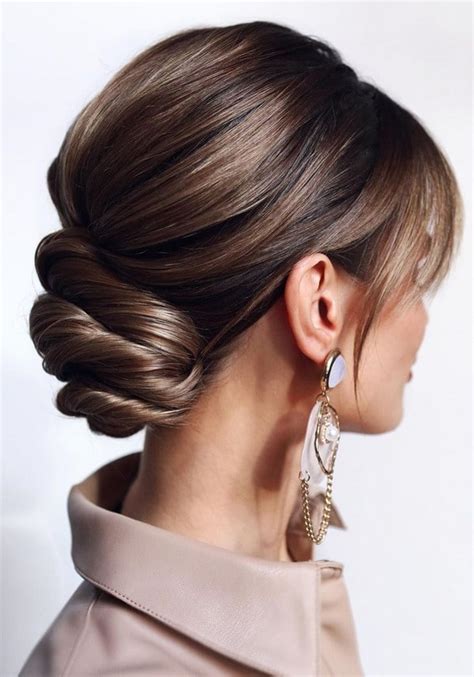 20 Low Bun Wedding Updo Hairstyles We Love Oh The Wedding Day