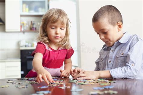 Children Playing Puzzles Stock Photo Image Of Preschool 18717628