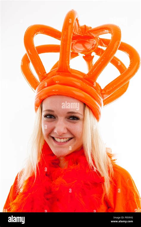Young Woman As Dutch Orange Supporter Over White Background Stock Photo