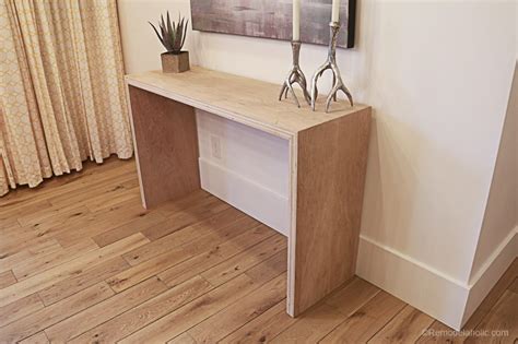 I added these to make is so that they could be. Remodelaholic | DIY Waterfall Plywood Console Table