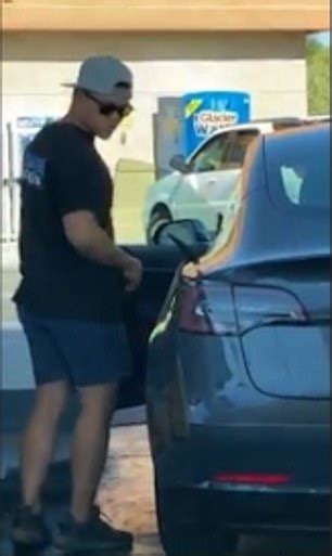 Hilarious Moment Driver Tries To Fill His Tesla At A Gas Station Before