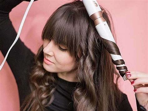 So if you want to create a tight, traditional, bouncy curl, hold your curling iron horizontally. Best Curling Irons for Fine Hair | Product Reviews and Tips