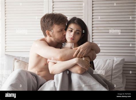 Boyfriend Hugging Girlfriend Asking For Forgiveness Stock Photo Alamy