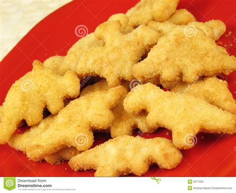 Take chicken and cut into cubes. Dinosaur Nuggets 2 stock image. Image of nugget, patty ...