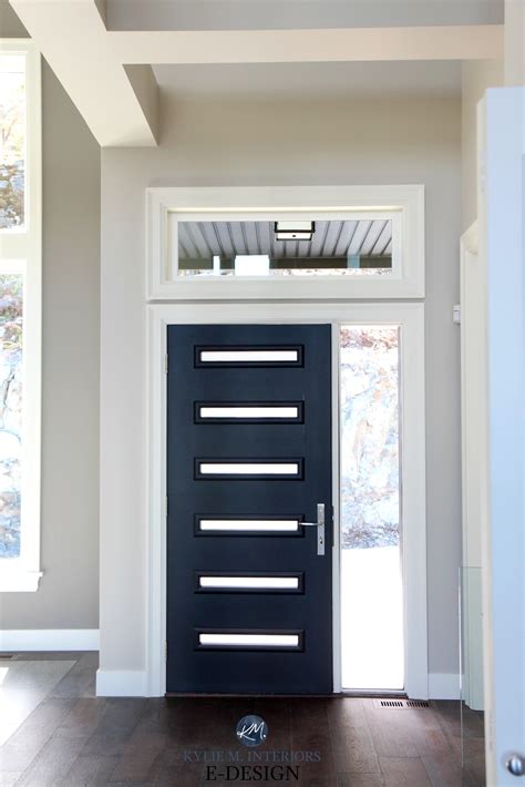 Modern Style Front Door With Windows Painted Black Dark Wood Flooring