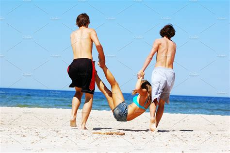 Friends Having Fun On The Beach High Quality People Images ~ Creative