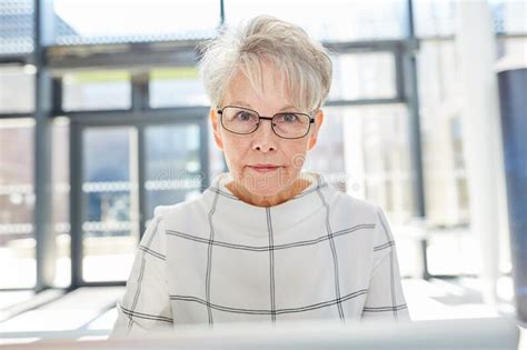 Senior Woman As A Successful Business Woman With Experience Stock Image
