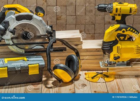 Construction Carpentry Electric Hand Tools On Wooden Background Stock