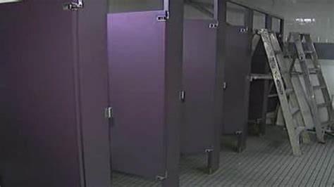 Peeping Toms Fall Through Bathroom Ceiling