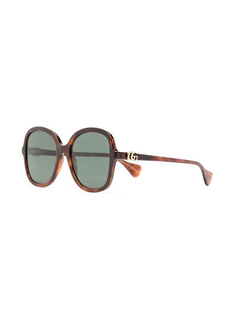 gucci eyewear tortoiseshell effect round frame sunglasses farfetch
