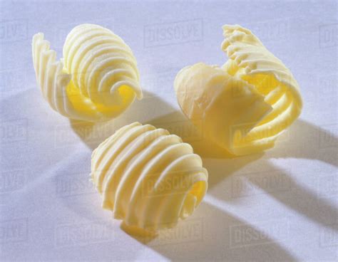 Three Butter Curls Stock Photo Dissolve