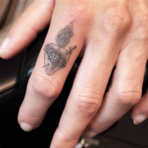 Sacred Heart Tattoo On Finger Best Tattoo Ideas Gallery