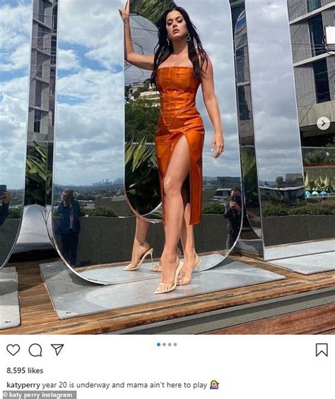 katy perry shows off sensational legs in shimmering orange split dress plugging